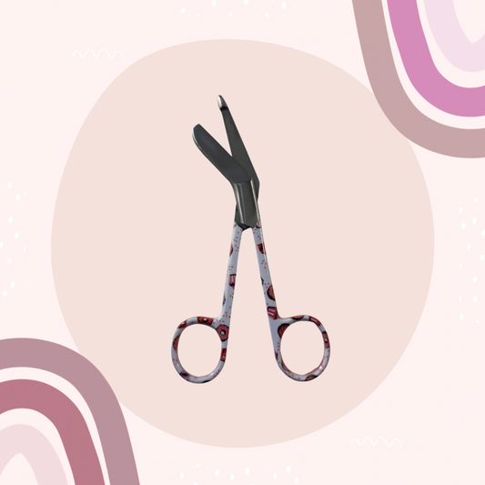 Sweet treats lister bandage scissors with curved handle and blunt safety tip. 